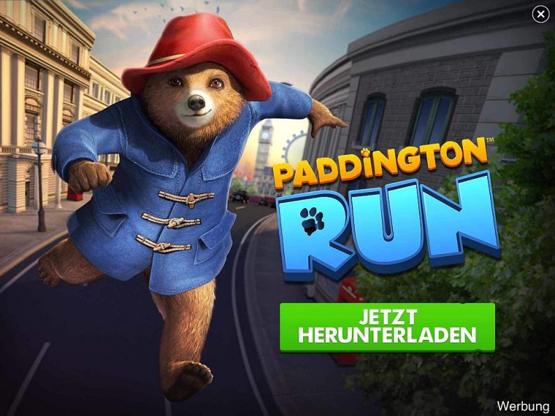 Werbung für das rechtzeitig vor Filmstart erschienene Mobile Game Paddington Run - als Banner, das den gesamten Bildschirm bedeckt. (Screenshot aus Gameloft Spiel Ciry Mania)
